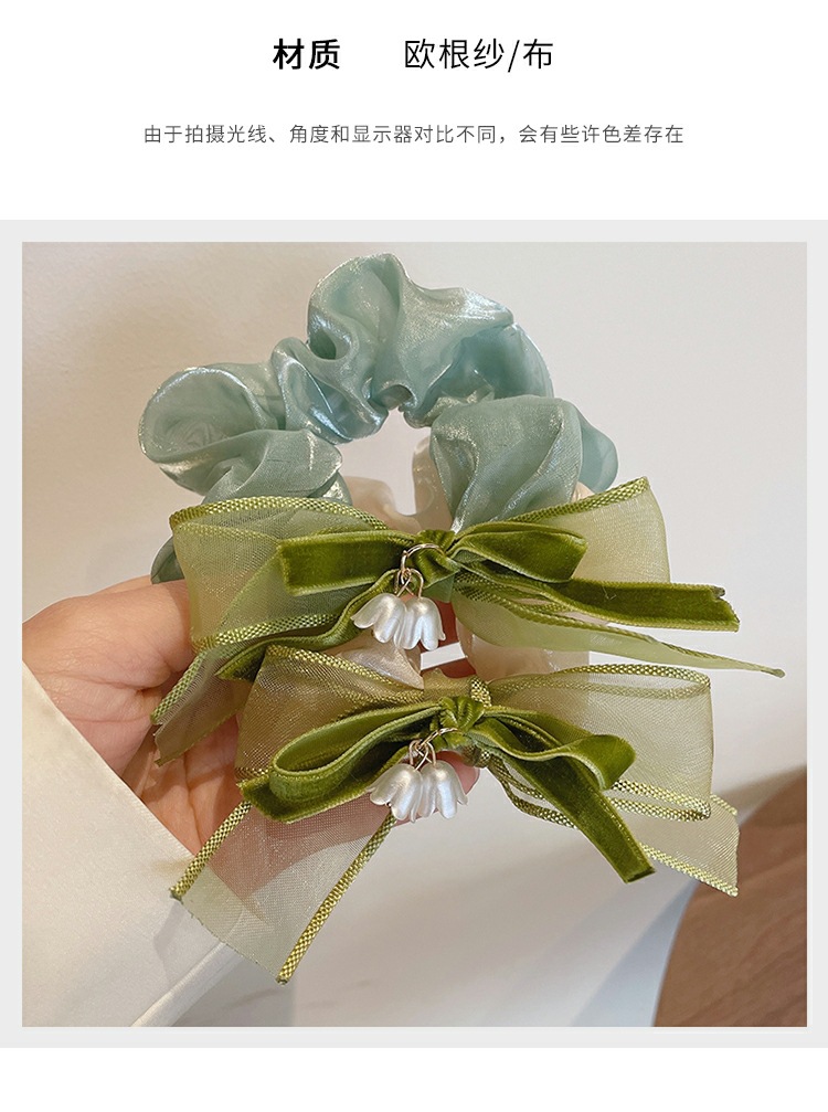 绿色蝴蝶结茶花肠圈