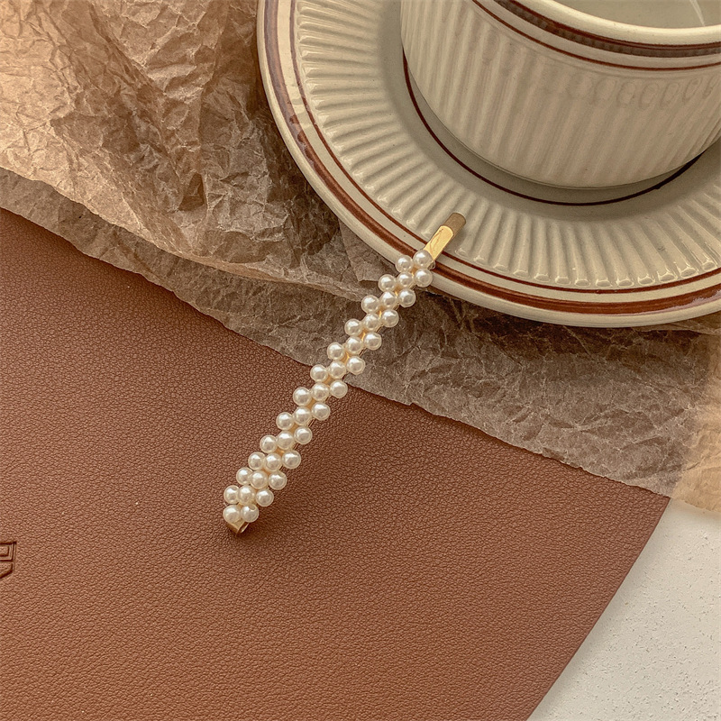 三排珍珠一字夹