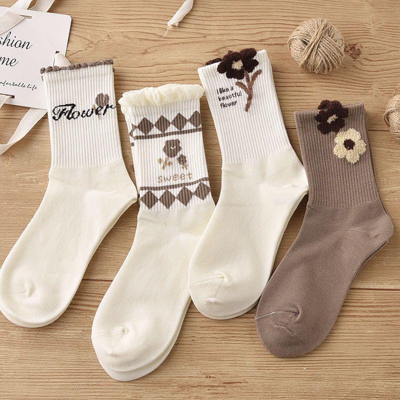 袜子女秋冬长筒袜百搭高颜值花边中筒森系毛绒花朵学生咖色ins