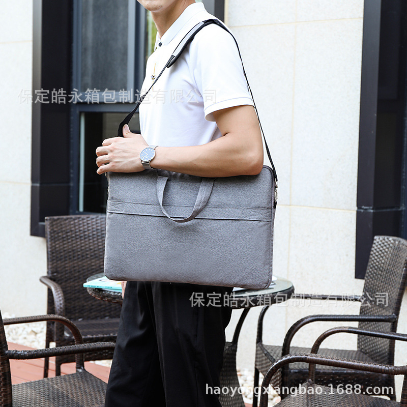 新款手提单肩电脑包男女通用款