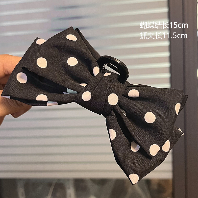 蝴蝶结抓夹-黑底白点