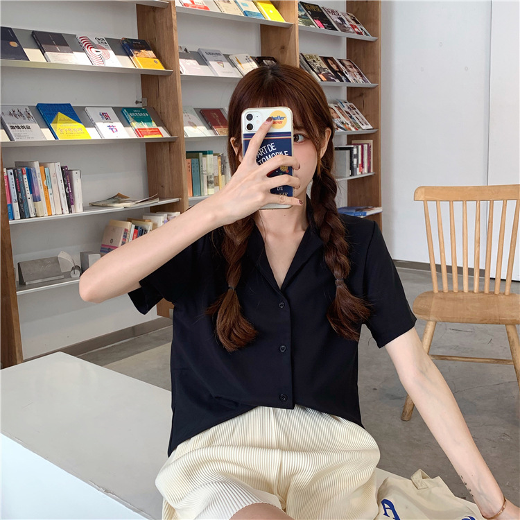 帮手描述图：气质翻领白衬衫女设计感小众上衣夏季2022年新款