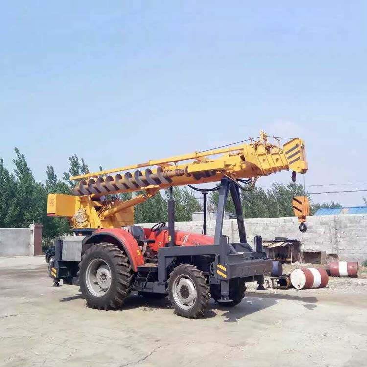 拖拉机打桩吊车多功能一体机 拖拉机改装吊车打桩一体电线杆安装