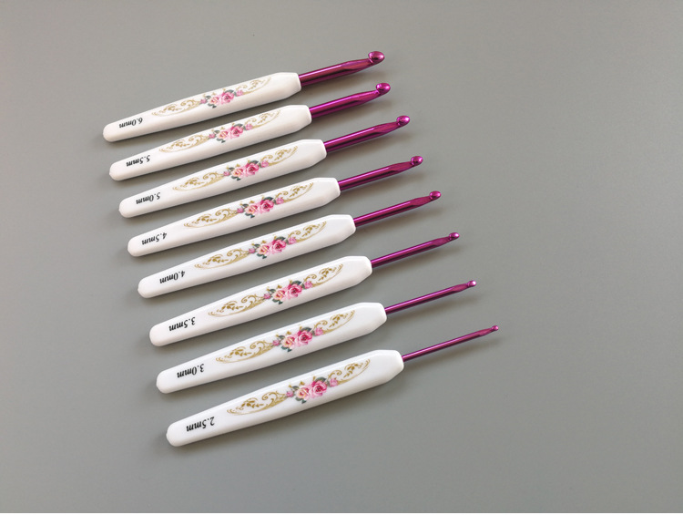 Herramientas de tejido de agujas de suéter transfronterizas ABS mango plástico impresión de agujas de poliestireno un conjunto completo de 16 piezas delgadas a gruesas