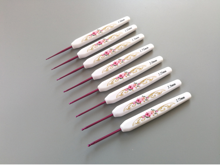Herramientas de tejido de agujas de suéter transfronterizas ABS mango plástico impresión de agujas de poliestireno un conjunto completo de 16 piezas delgadas a gruesas