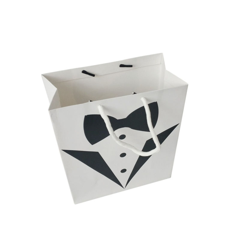 En stock blanco al por mayor bolsa de cartón regalo de mano bolsa de papel blanco y negro vestido bolso de compras bolsa de almacenamiento bolsa de embalaje