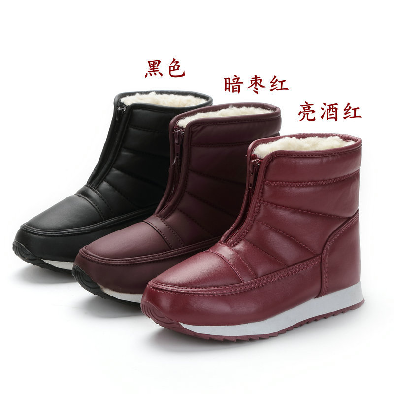 Distribución de envío gratuito de invierno de mediana edad joven anti-deslizante zapatos de nieve zapatos de algodón con cremallera de tubo corto