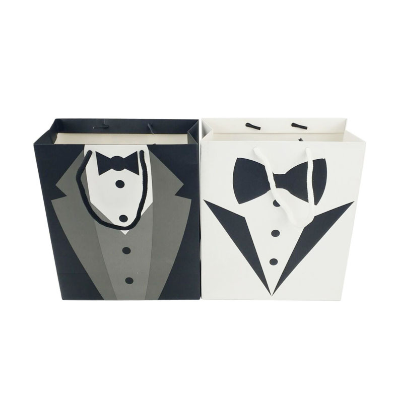 En stock blanco al por mayor bolsa de cartón regalo de mano bolsa de papel blanco y negro vestido bolso de compras bolsa de almacenamiento bolsa de embalaje