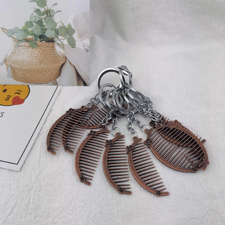 A1242 antiguo pequeño peine de cobre llavero bolso de la vendimia colgante Yiwu 2 yuanes