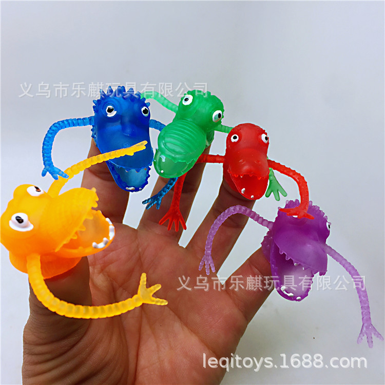 Dinosaurio dedo juguete cuento de los niños dedo juguete regalo juguete nuevo juguete extraño venta al por mayor