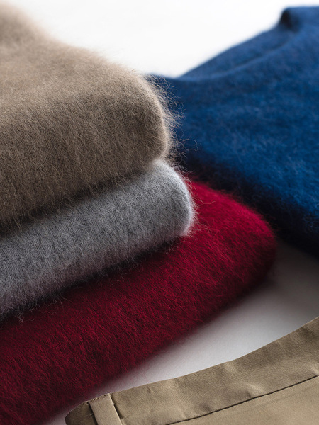 Demi-season solid woolen knitted base sweater with a round collar