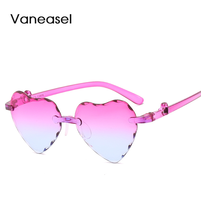 Nuevo gradiente colorido de dibujos animados amor gafas de sol para niños 62001 sin marco recorte melocotón corazón gafas de sol para niños al por mayor