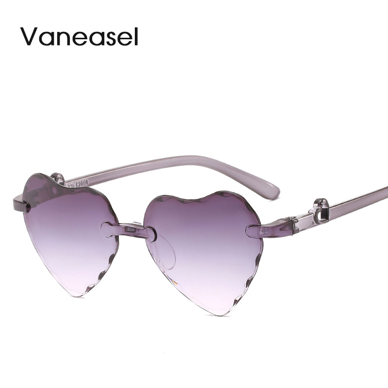 Nuevo gradiente colorido de dibujos animados amor gafas de sol para niños 62001 sin marco recorte melocotón corazón gafas de sol para niños al por mayor