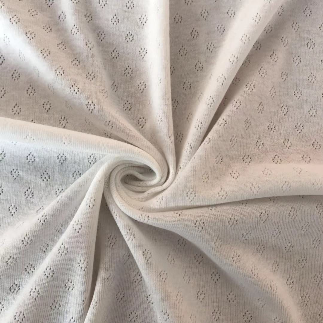 婴儿亲肤面料爬爬装面料全棉罗纹心型提花罗纹针织面料