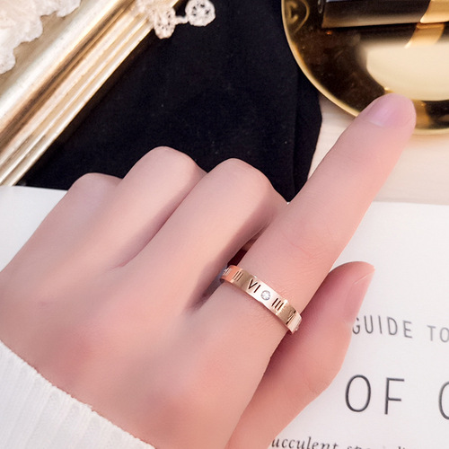 European and American 18k rose gold titanium steel Roman numeral ring Diamond hollow couple alphabet ring for men and women