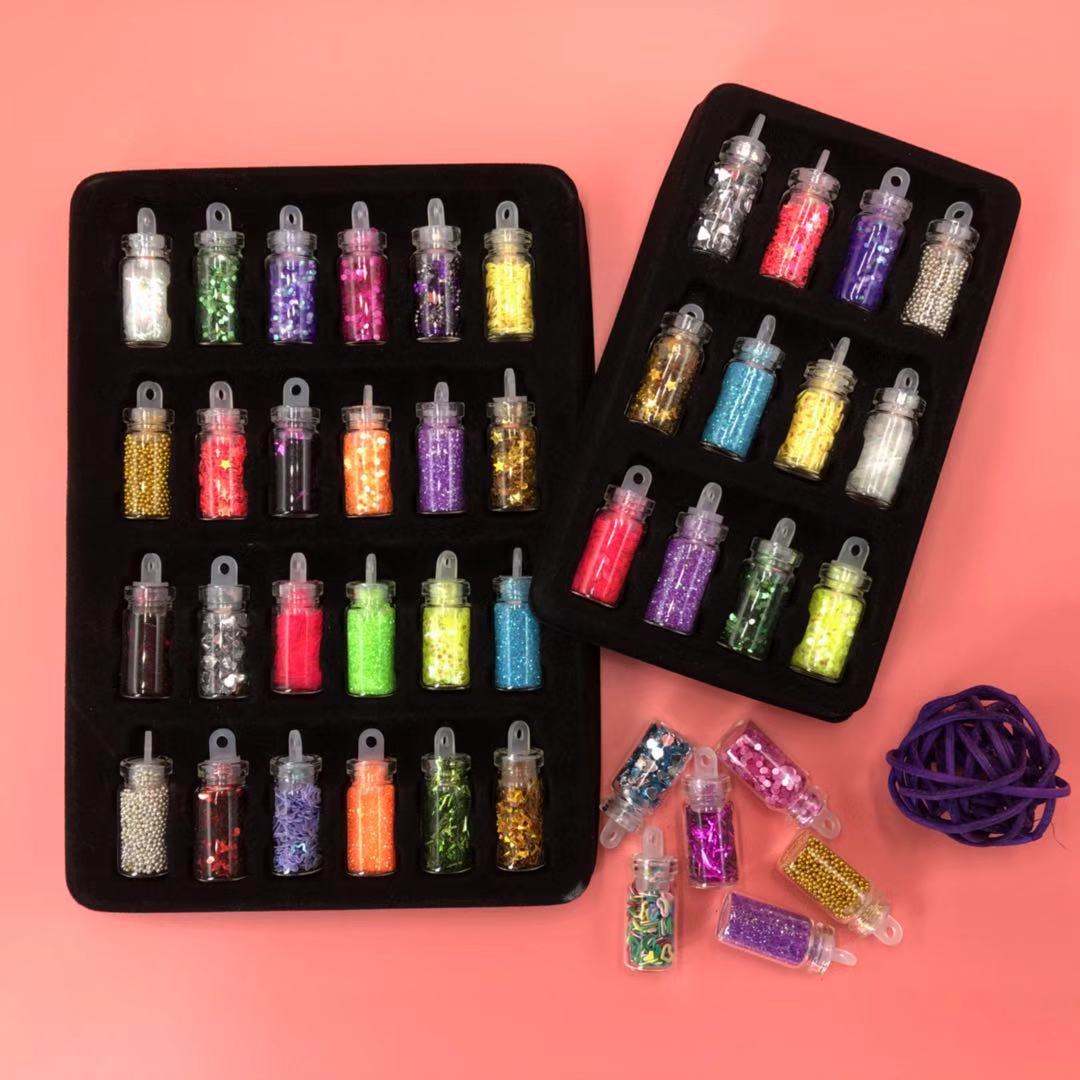 Directo de fábrica 24-color botella de vidrio brillo lentejuelas hexagonal joyería de uñas paquete de material de relleno Delgado