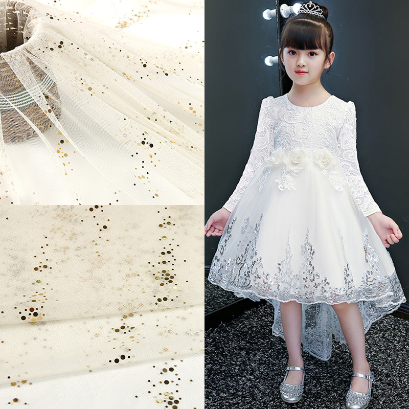 厂家批发直销 六角网冲片网纱银河小点 童装连衣裙网纱面来哦