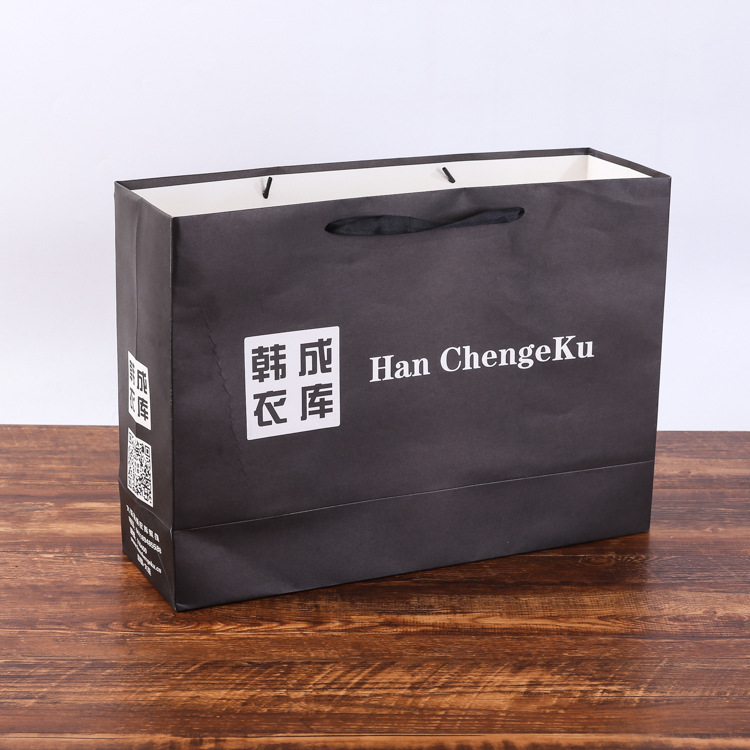 新款创意白卡纸黑色服装手提购物袋 牛皮纸袋定做广告礼品袋印刷