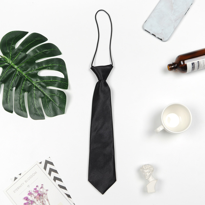 Hombres y niñas estudiantes de color sólido corbata pequeña al por mayor rendimiento del equipo de escenario negro tibetano azul spot fábrica directa