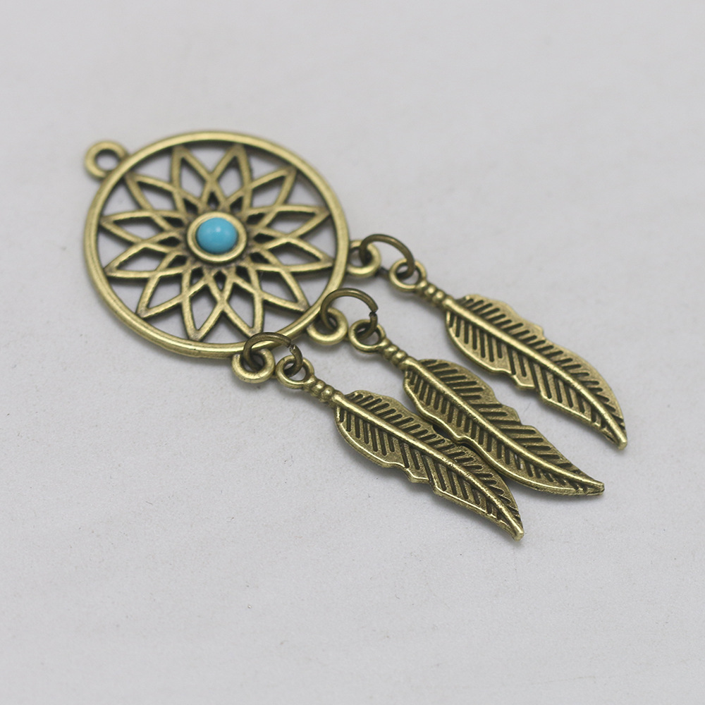 Bronze pendant with tassels