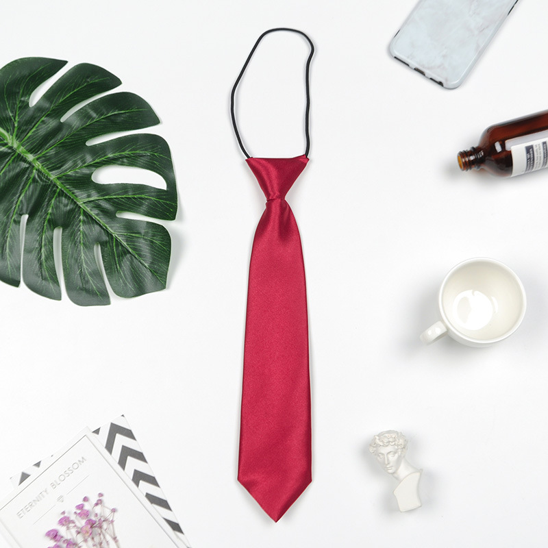 Hombres y niñas estudiantes de color sólido corbata pequeña al por mayor rendimiento del equipo de escenario negro tibetano azul spot fábrica directa