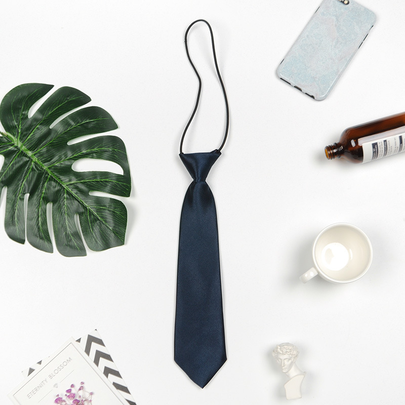 Hombres y niñas estudiantes de color sólido corbata pequeña al por mayor rendimiento del equipo de escenario negro tibetano azul spot fábrica directa