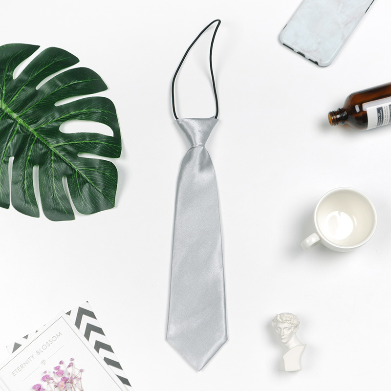 Hombres y niñas estudiantes de color sólido corbata pequeña al por mayor rendimiento del equipo de escenario negro tibetano azul spot fábrica directa