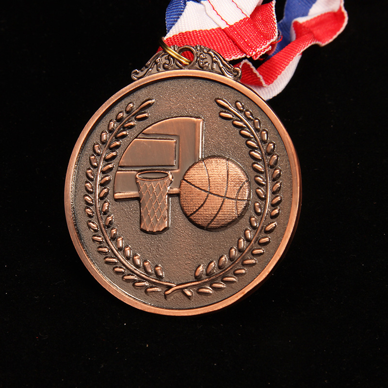 Fabricante alemán de modelos personaliza medallas de baloncesto de metal galvanizado para competiciones y premios de baloncesto.