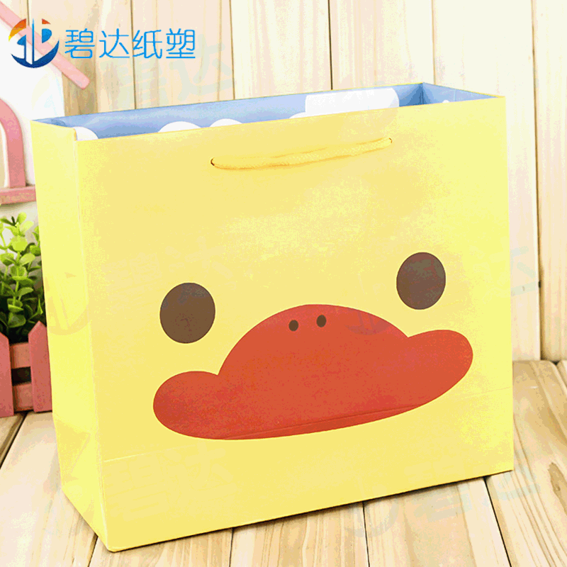 厂家制作牛皮纸购物服装手提袋可做礼品包装袋可印刷logo