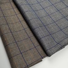 厂家直销色织弹力TR格子秋冬时装吊带连衣裙休闲西装面料现货供应