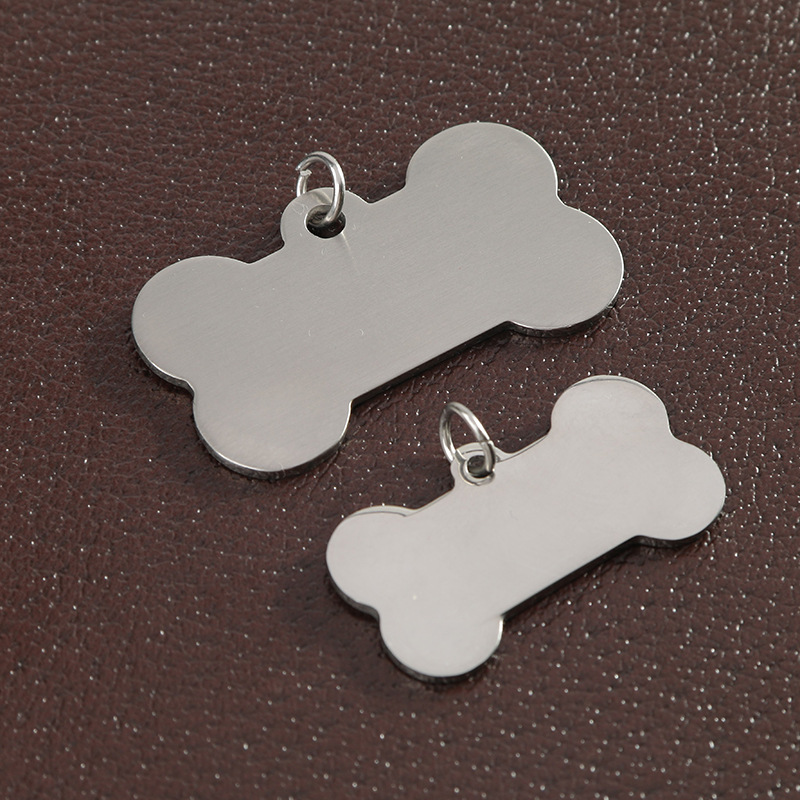 Fuente transfronteriza etiqueta de perro de acero inoxidable etiqueta de hueso de acero de titanio etiqueta de perro de garra hueca etiqueta de perro etiqueta de perro en blanco