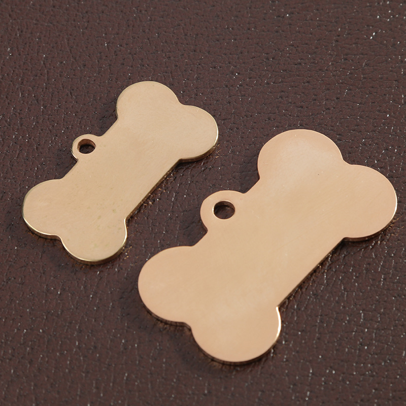 Fuente transfronteriza etiqueta de perro de acero inoxidable etiqueta de hueso de acero de titanio etiqueta de perro de garra hueca etiqueta de perro etiqueta de perro en blanco