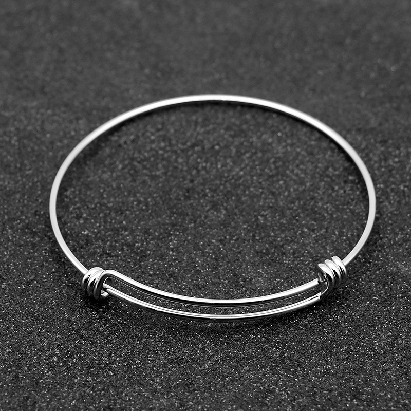 Acero inoxidable ajustable DIY pulsera de boca abierta Push-Pull alambre resorte elástico bobina pulsera accesorios de la joyería en stock