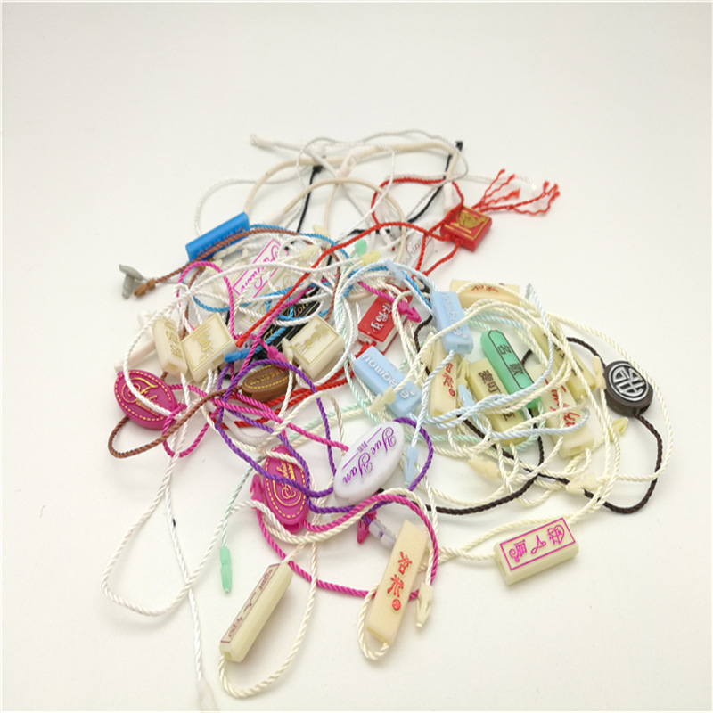 吊粒吊牌 穿绳吊牌制作  吊牌吊粒厂家 纸质塑料吊牌生产厂家