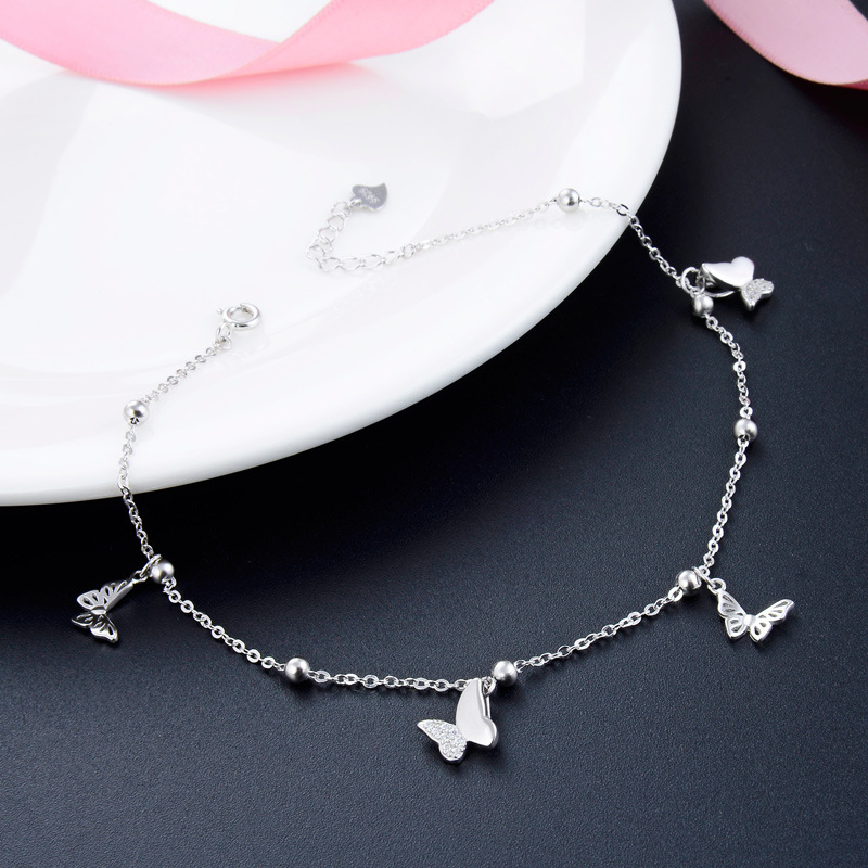 Estilo coreano transfronterizo nueva moda temperamento mujer estudiante pie joyería s925 plata diamante-incrustado personalidad creativa mariposa tobillera