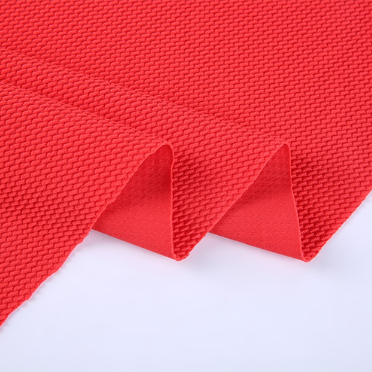 供应涤氨蚂蚁泡泡乱麻单面提花针织布 斜纹小米粒高弹面料