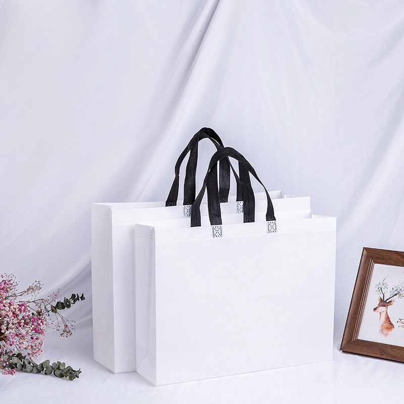 Bolso no tejido recubierto blanco en stock bolsa de ropa de educación escolar y entrenamiento bolsa no tejida en stock logotipo impreso