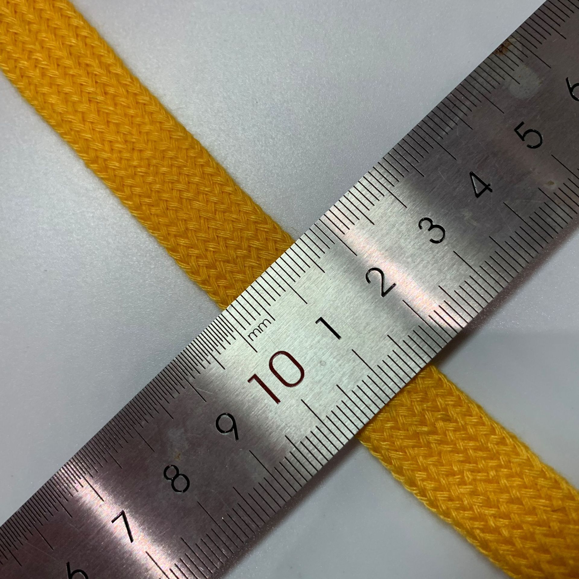 Fabricante en stock cinta de color 1,5 CM cuerda de algodón plana hueca de doble capa ropa tejida sombrero cuerda de la cintura cordón