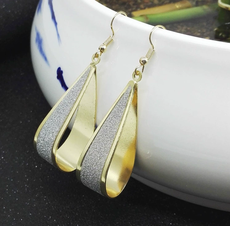 Earrings — European punk style, metallic twists and drops, gold/silver/black, lightweight