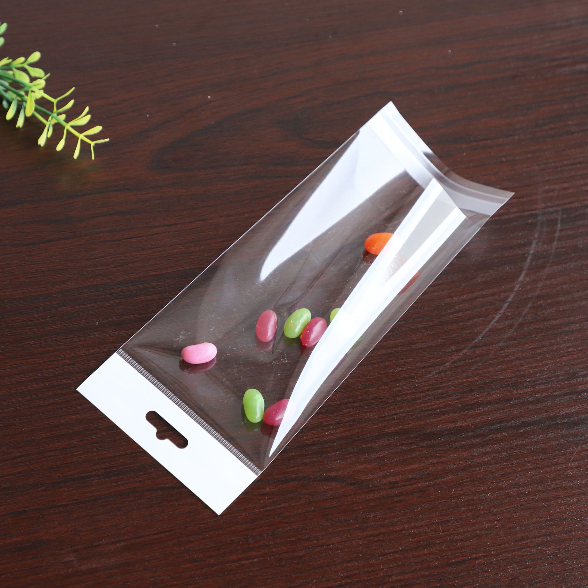 现货批发塑料打包袋透明OPP自封袋贴纸专 用包装袋彩色印刷圆孔袋