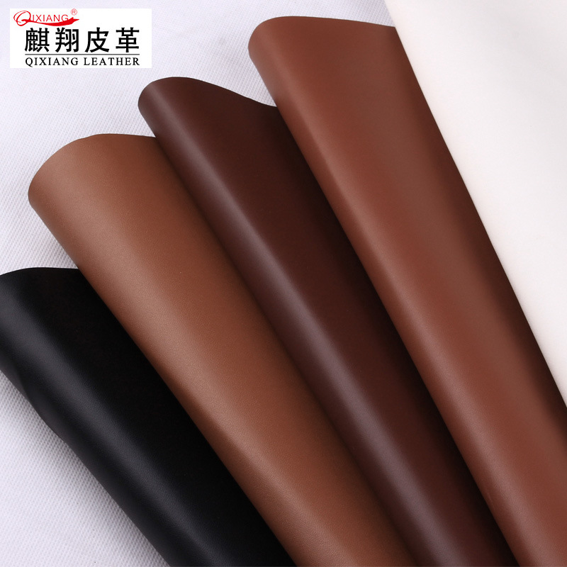 厂家直销 B100纹pu皮革面料0.7厚TC布底细纹平纹人造革针孔纹皮料