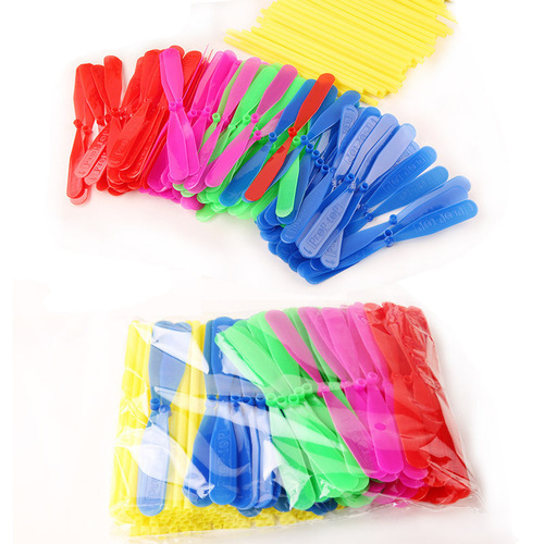 Small gifts for local promotion, plastic flying fairy, luminous flying saucer, bamboo dragonfly slingshot and arrow children's small toys