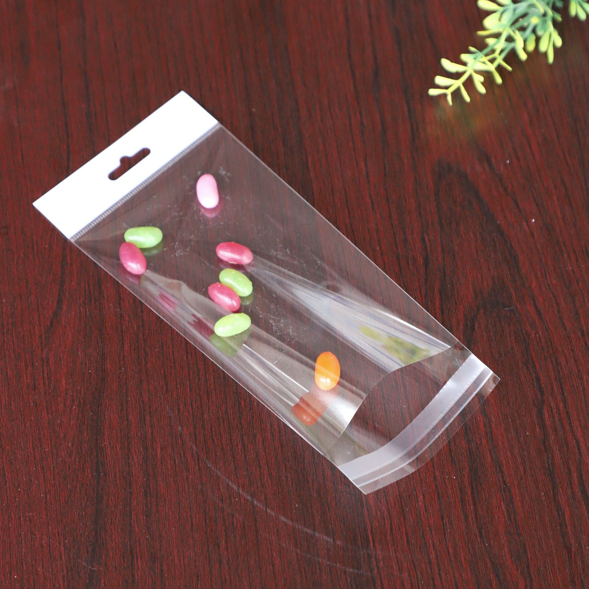 东莞工厂批发加厚飞机孔卡头自粘袋渔漂钩具白色挂孔袋印刷LOGO