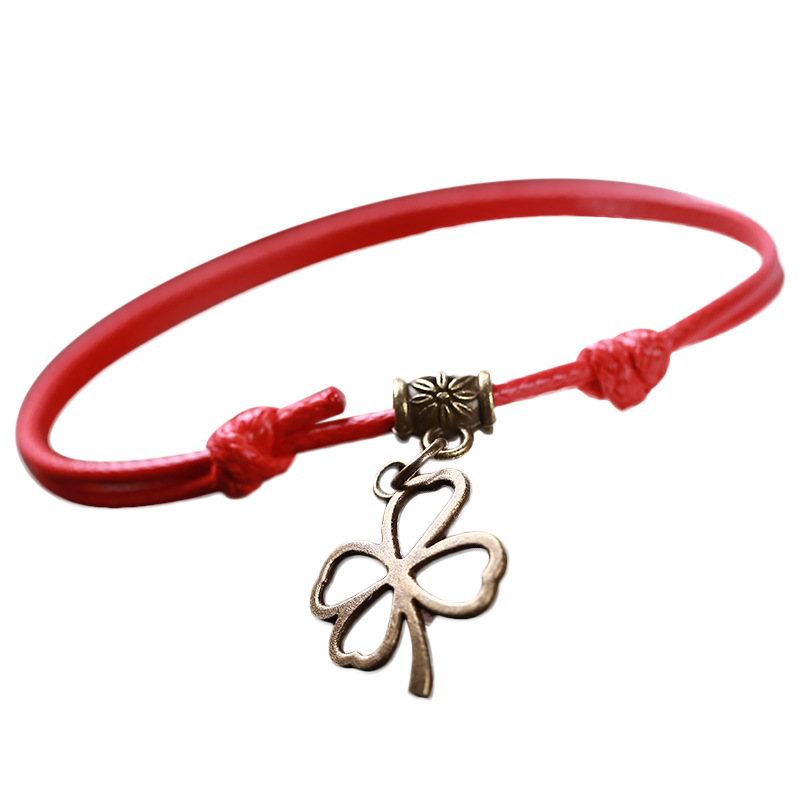 Pulsera tejida a mano – motivos trébole/póker, estilo unisex vintage