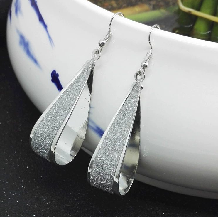 Earrings — European punk style, metallic twists and drops, gold/silver/black, lightweight