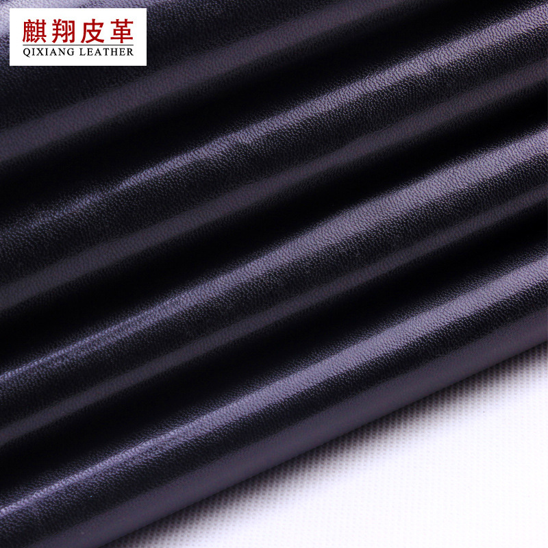 义乌厂家直销 DE35纹pu皮革面料0.7mm厚TC布底皮带革沙发人造革