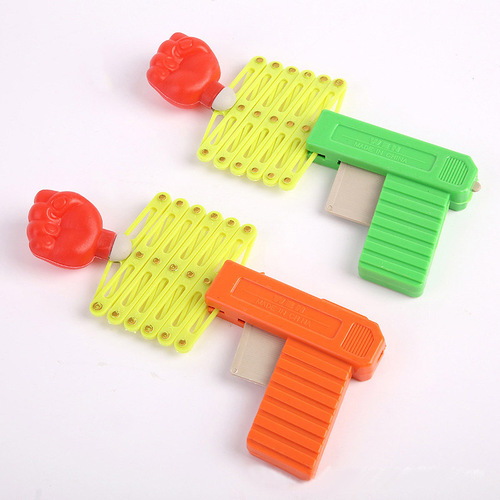 Street stall children's toys funny magic gun children's toy gun baby Yiwu educational telescopic fist gun elastic gun