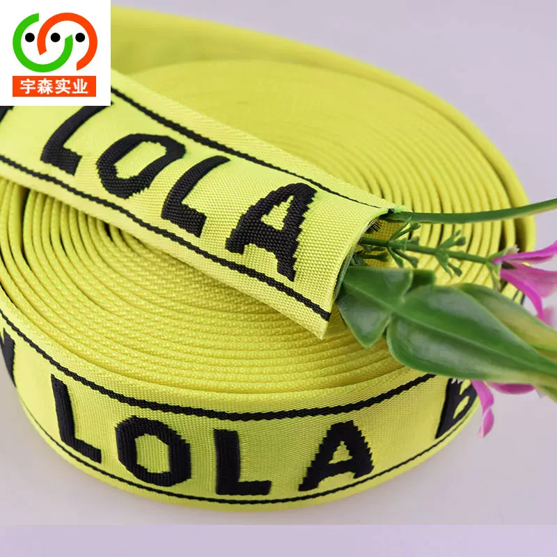 厂家直销 6cm空心织带涤纶双层管状黑色字母黄色空心提花织带批发