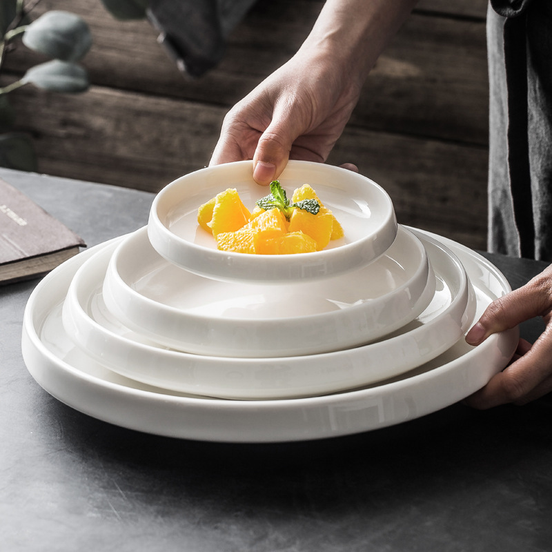 Japanese fruit salad plate hotel ceramic tableware steak plate thick edge shallow soup plate creative white dinner plate wholesale Japanese fruit salad plate hotel ceramic tableware steak plate thick edge shallow soup plate creative white dinner plate wholesale