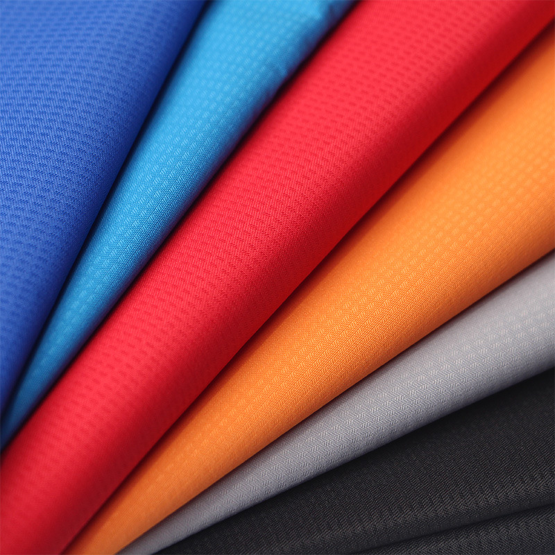 现货pvc防水防风布料 提花斜格套格冲锋衣户外防寒服校服工装面料